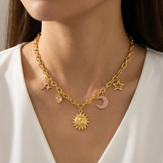 Collier à breloques lune et soleil rosé