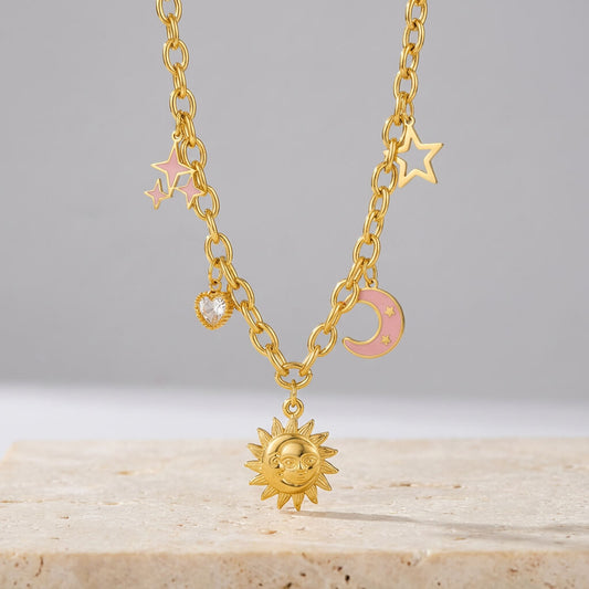 Collier à breloques lune et soleil rosé