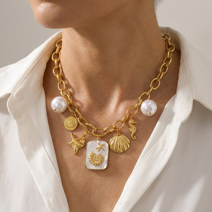 Collier océan perle et étoile de mer dorée