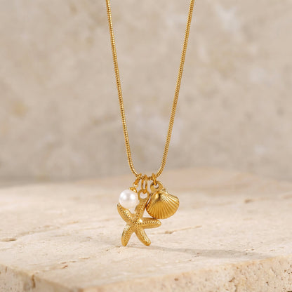 Collier charms perle étoile et coquillage en acier inoxydable