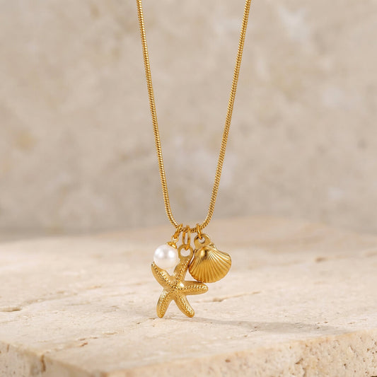 Collier charms perle étoile et coquillage en acier inoxydable