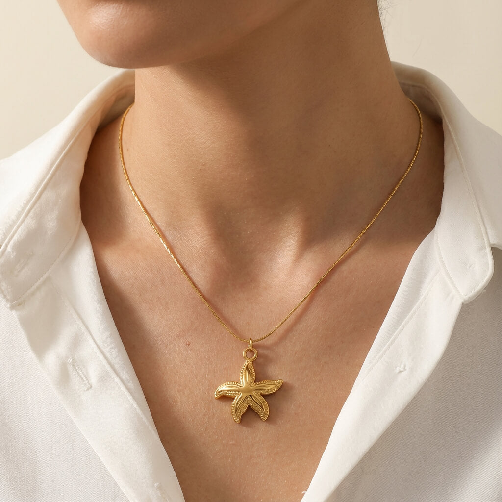 Collier étoile de mer dorée à pendentif