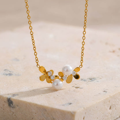 Collier fleur perle et zircon doré