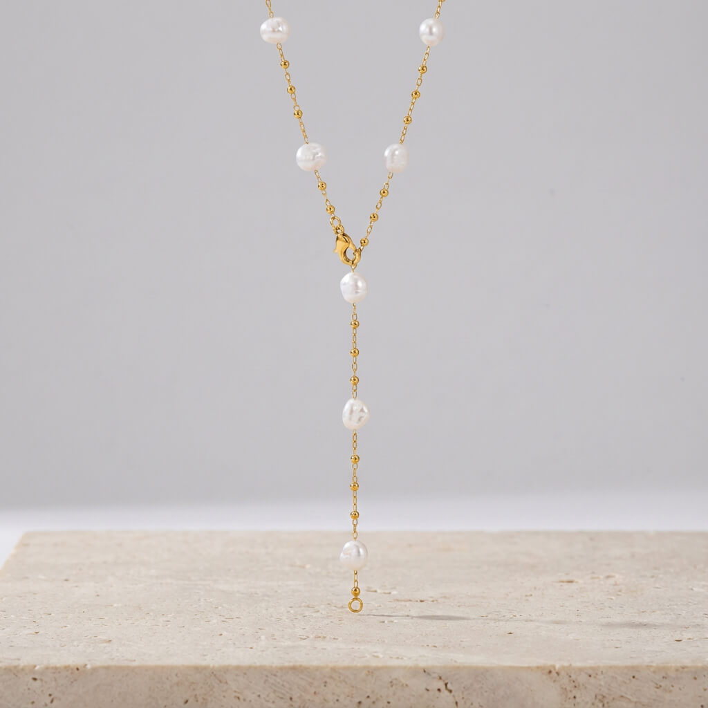 Collier long Y plaqué or perles nacrées